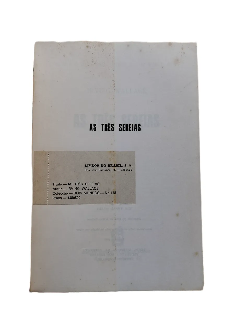 as tres sereias irving wallace folha de guarda Folha de guarda do livro As Três Sereias de Irving Wallace, apresentando sinais de oxidação.